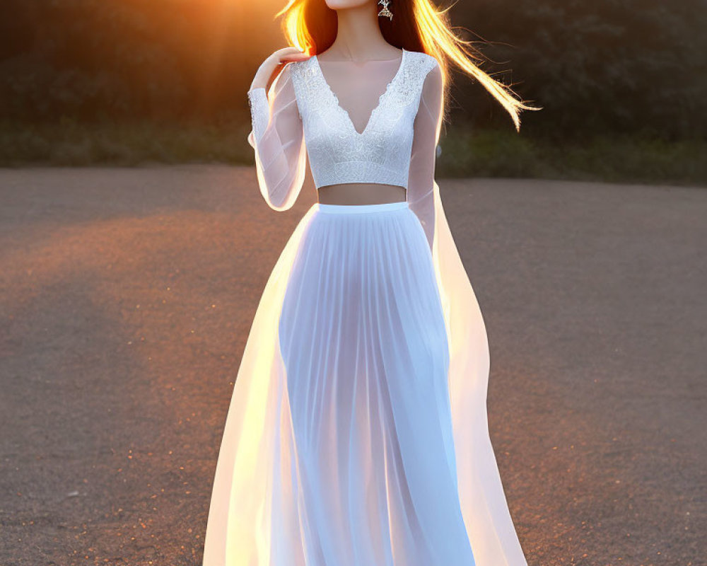 Elegant woman in white dress at golden hour