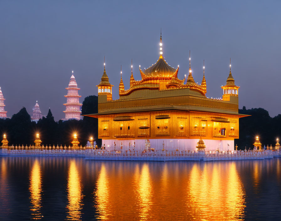 Traditional building reflecting on water at twilight with pagoda-style towers