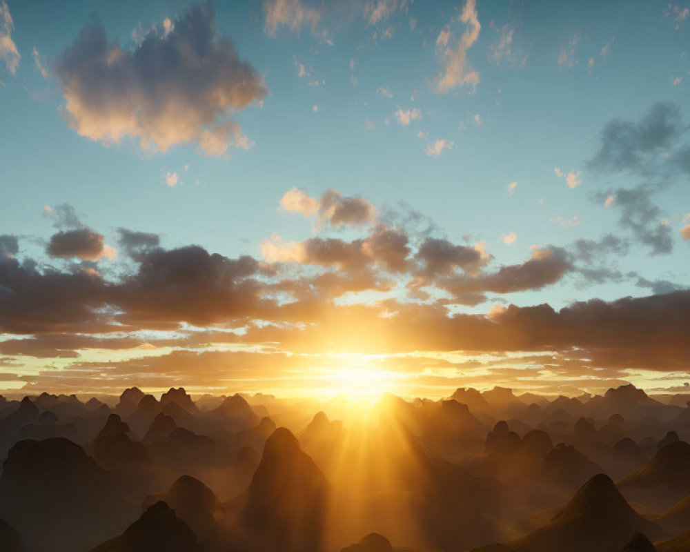 Scenic sunrise over rugged mountain landscape with scattered clouds