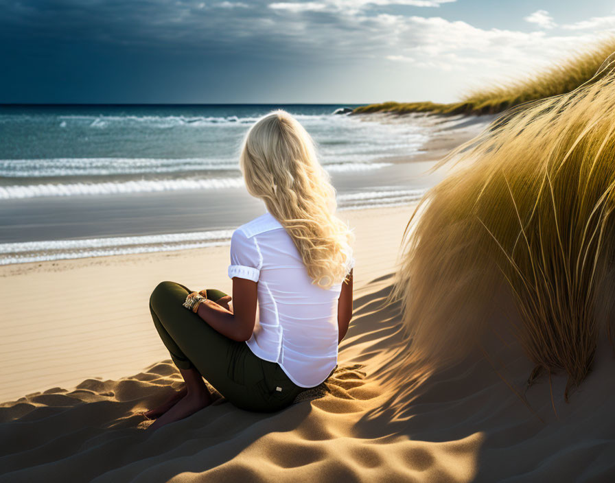 blond haired woman sitting on the beach