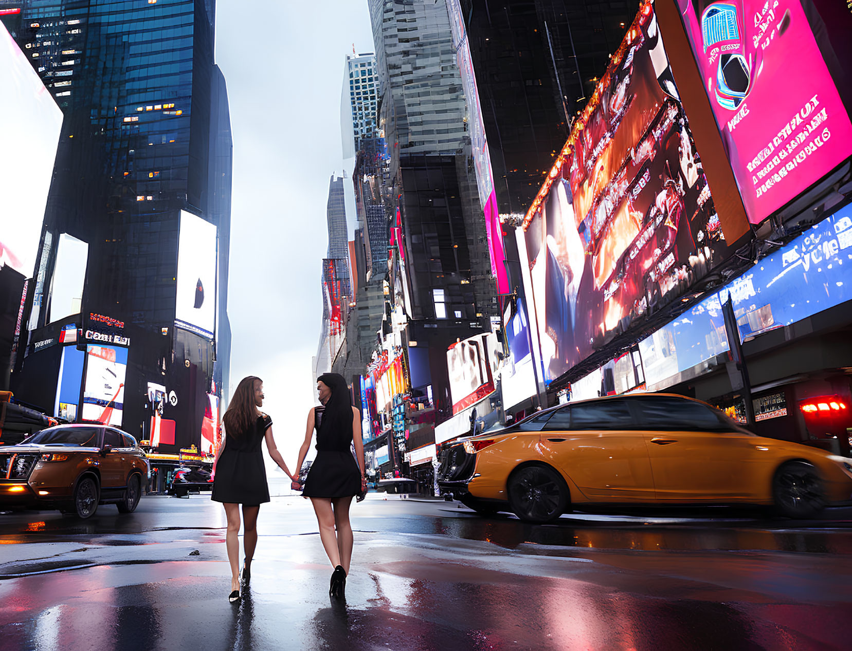 Busy Times Square with Two Women Walking at Night