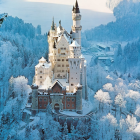 Ethereal fantasy castle with golden and stone spires on cliff amid misty mountains
