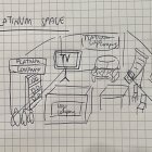 Room interior sketch on grid paper with couch, coffee table, and floor lamp.