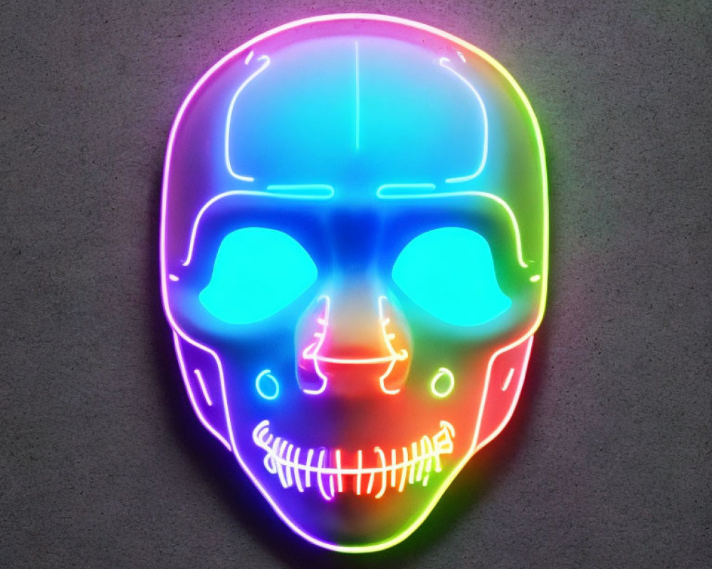 Vibrant neon skull sign with purple, green, and yellow gradient on gray wall