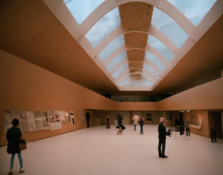 Spacious Art Gallery with Curved Ceiling and Skylights