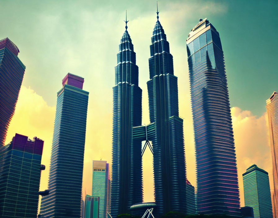 Iconic Petronas Twin Towers Surrounded by Skyscrapers at Sunset