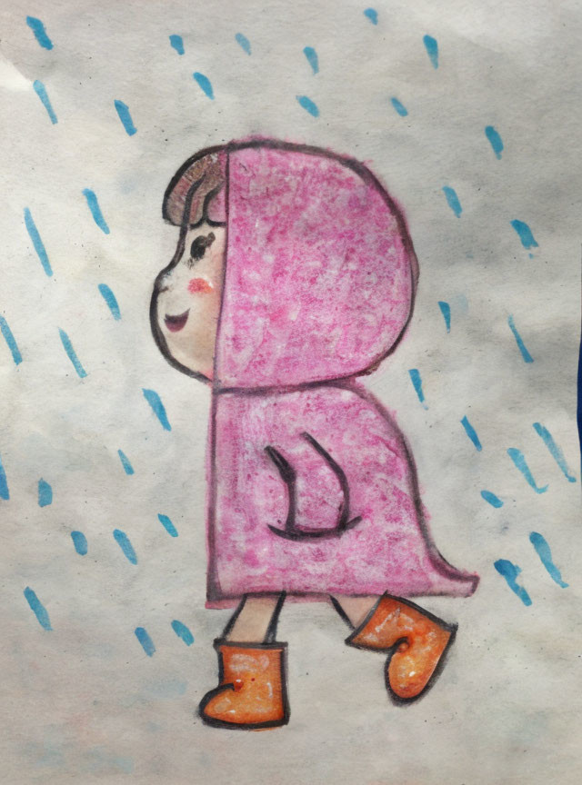 Cheerful child in pink raincoat and orange boots walking in blue raindrops