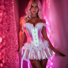Digital artwork: Woman in ornate lingerie on pink backdrop
