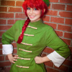 Person in Bright Green Outfit with Red Braid Smiling Against Brick Wall