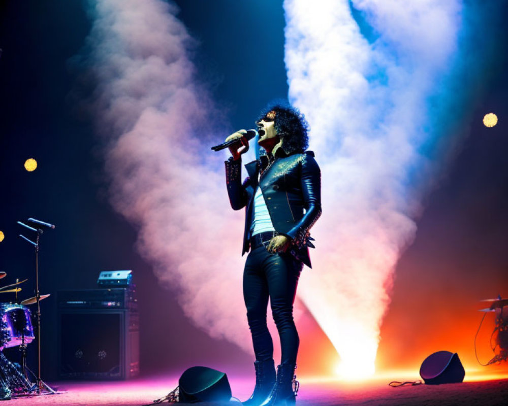 Performer on Stage with Microphone and Blue Lights