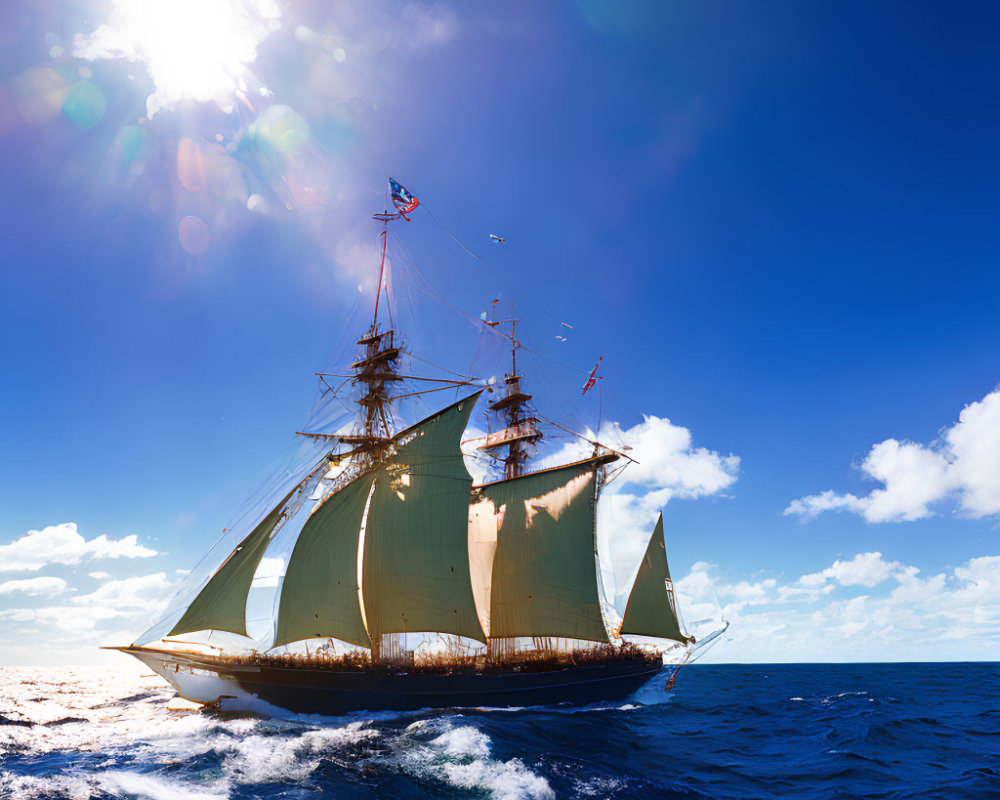 Majestic tall ship sailing on sunlit ocean under blue sky
