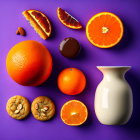 Orange-toned desserts and fruits with cake slices and chocolate on purple background