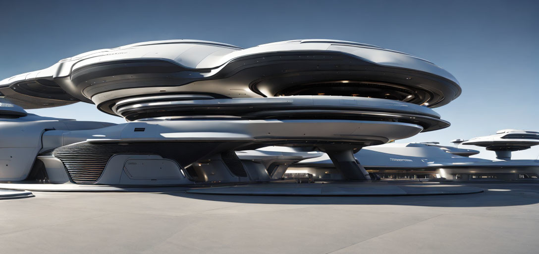 Sleek, multi-tiered futuristic building under clear blue sky