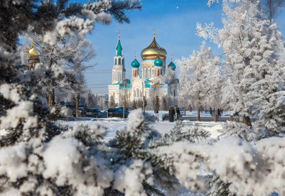 Snowy Landscape with Frosted Trees and Colorful Orthodox Cathedral