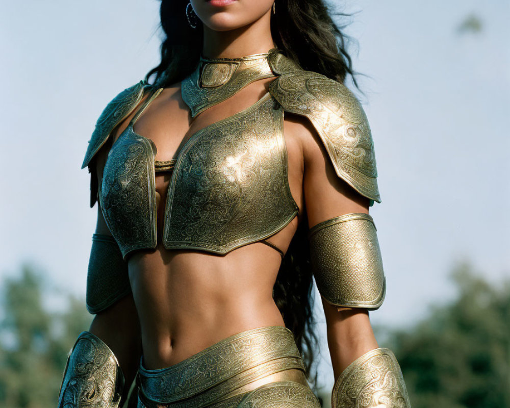 Golden armored woman poses confidently in natural setting with flowing hair