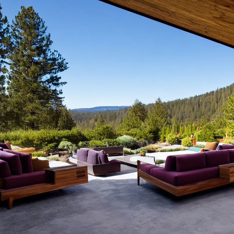 Contemporary outdoor patio with purple sofas under a roof, serene landscape view.