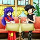 Two individuals with bright blue hair at a yellow diner table with condiments and drinks.