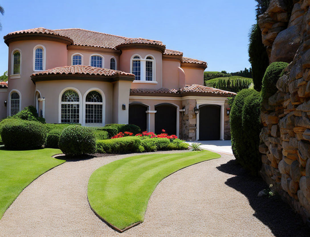 Luxurious Two-Story House with Terracotta Roof and Manicured Lawn