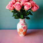 Pink Roses Bouquet in Clear Vase on Blue and Pink Background