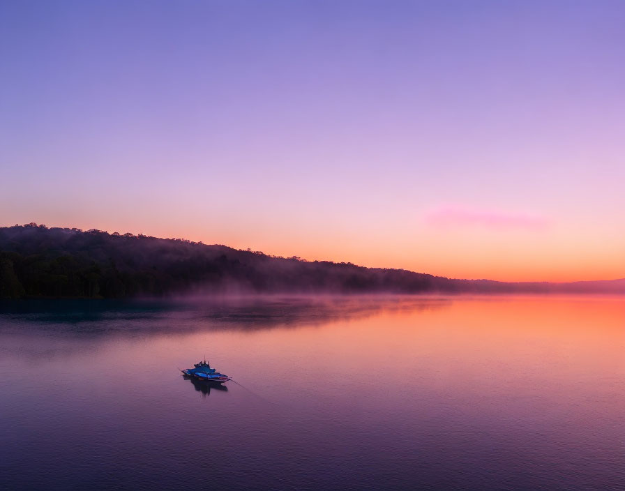 Tranquil Sunrise Scene: Lake, Boat, Mist, Colorful Sky