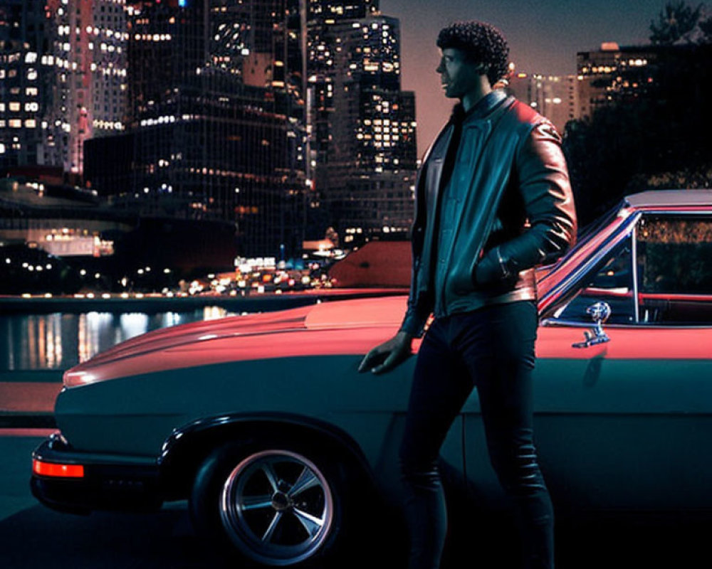 Man in Leather Jacket Leaning on Vintage Car at Night
