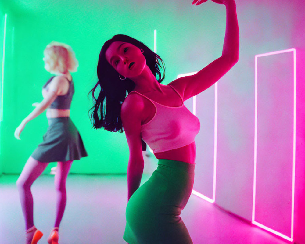 Vibrant neon-lit room with two women dancing