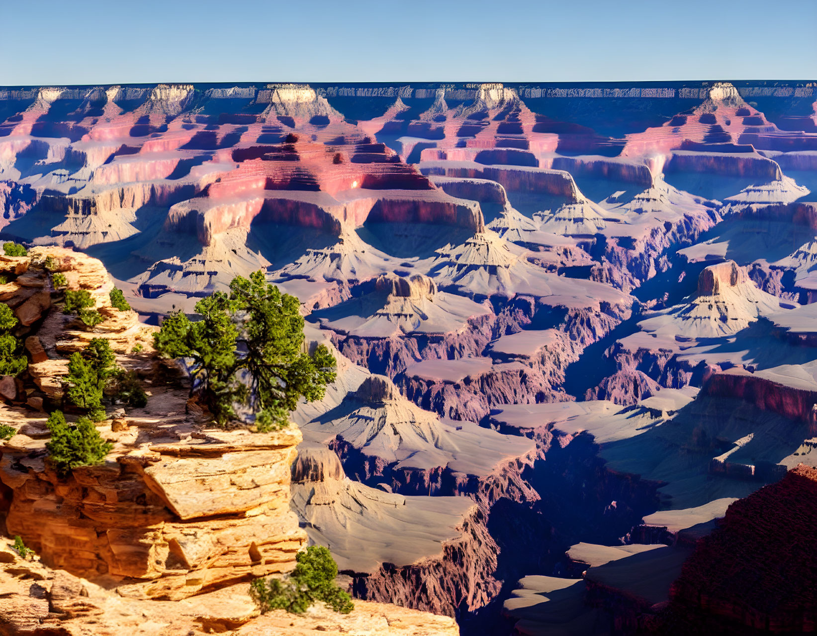 Scenic Grand Canyon Landscape with Red Rocks and Blue Sky