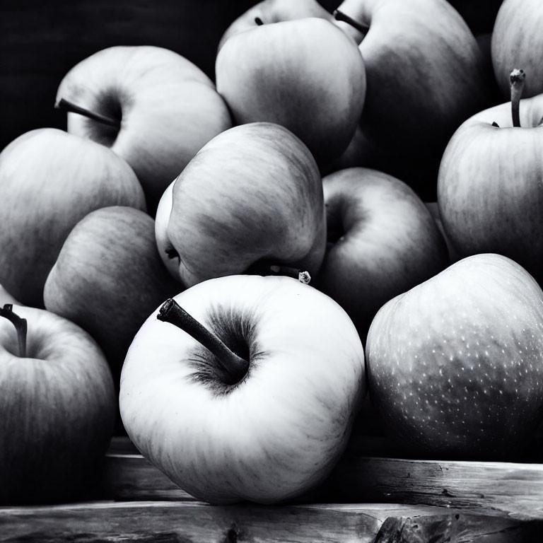 Monochrome image of textured apples in varying shades