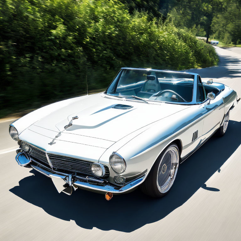 Vintage convertible car with white paint and stripes cruising tree-lined road on sunny day