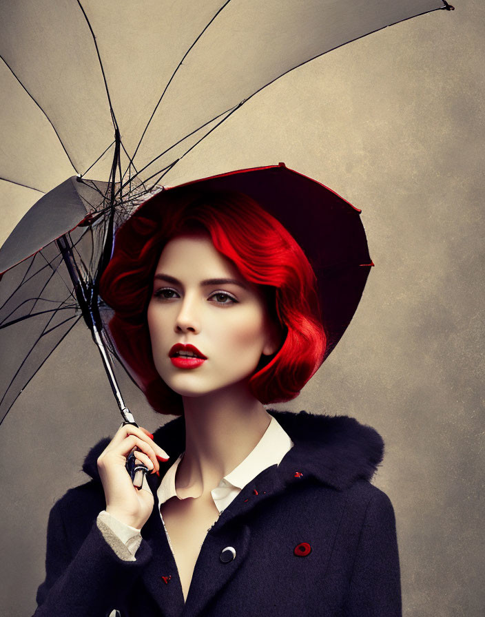 Stylish woman with red hair holding an umbrella in black coat against beige background