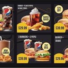 Assorted Burgers with Toppings, Sides, and Drink on Dark Background