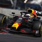 Red Bull Racing Formula 1 Car and Driver Cornering on Racetrack