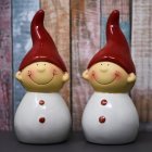 Decorative Santa Claus Christmas lights with red hats and white bases indoors