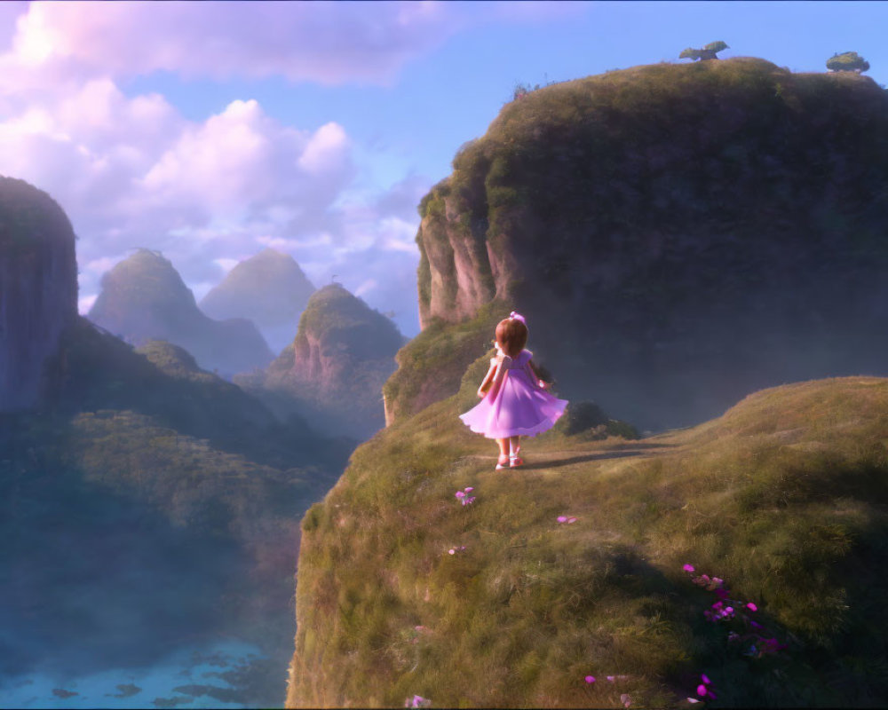 Young girl in pink dress on green hill looking at misty mountains under pink sky