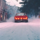 Vintage Car with Glowing Rear Lights on Snow-Covered Street at Twilight