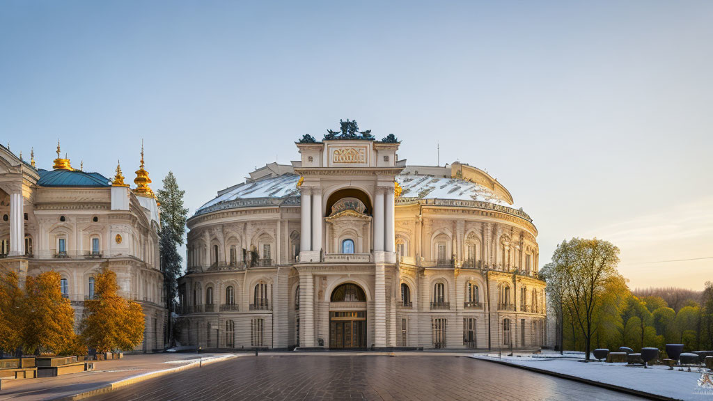 Neoclassical building with dome and wings under sunlight