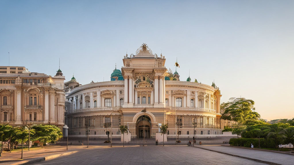Ornate neoclassical building with domes and flags in sunlight