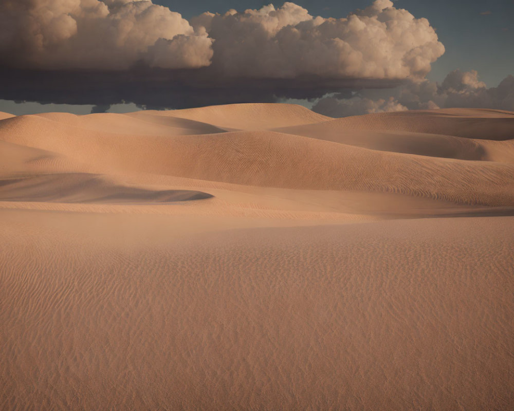 Cloudy Sky Over Undulating Sand Dunes with Shadows