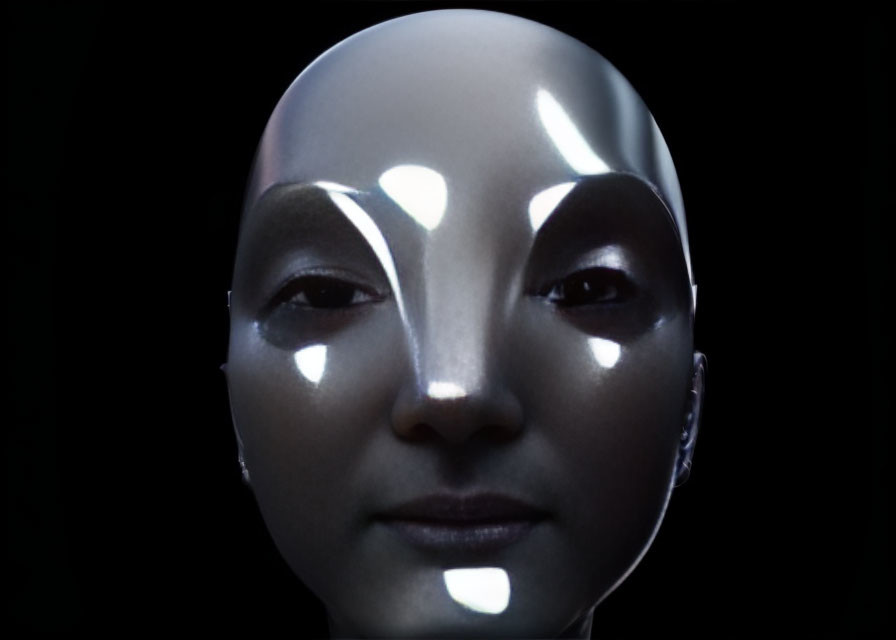 Metallic-skinned humanoid face in white light on dark background
