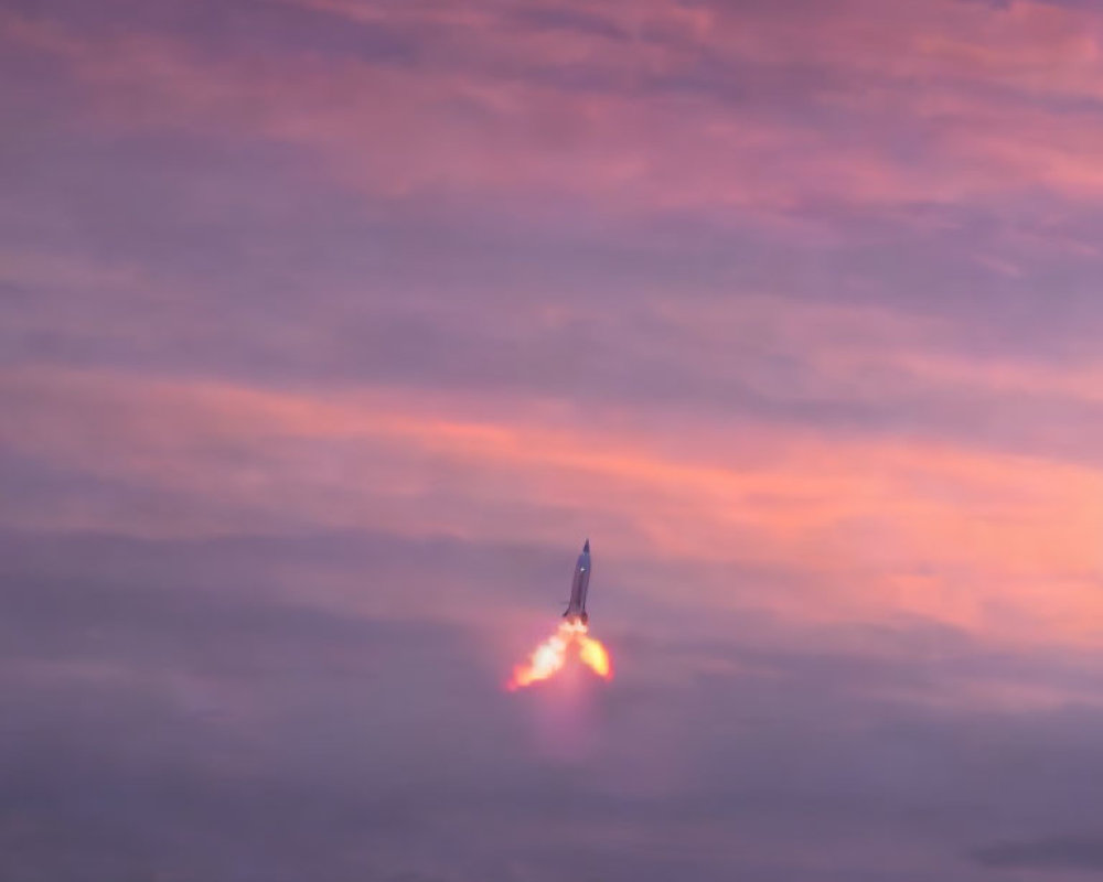 Space shuttle ascending through purple and pink twilight sky with blazing engines