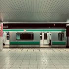 Sleek modern subway train at clean underground platform