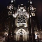 Gothic fantasy cathedral with illuminated windows at night