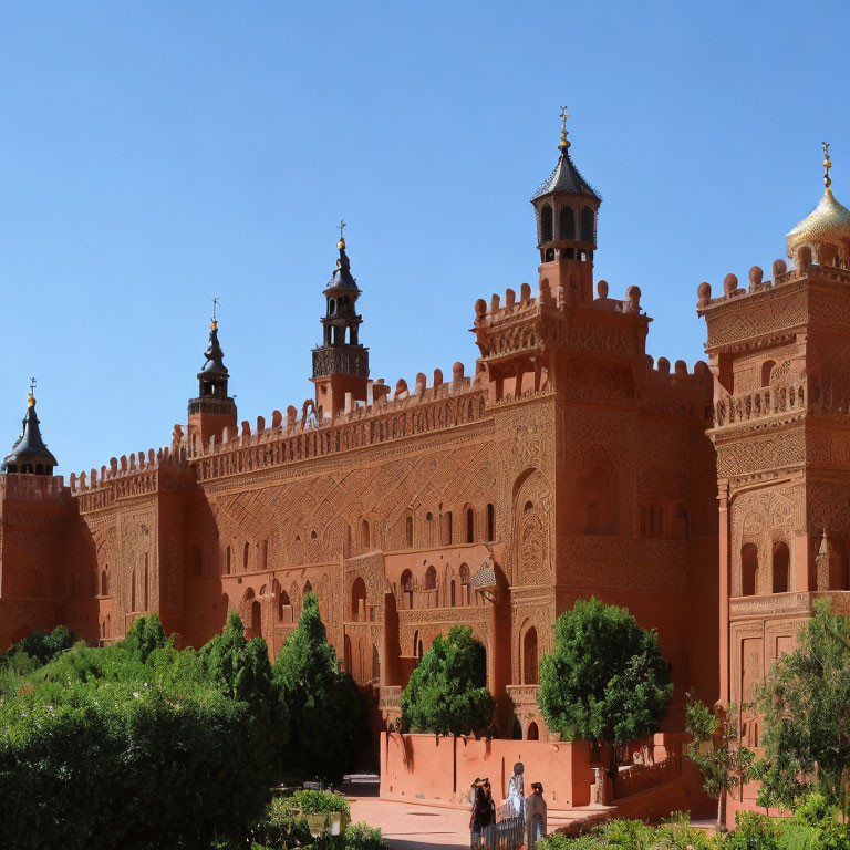 Terracotta-Colored Palace with Towering Minarets and Lush Gardens