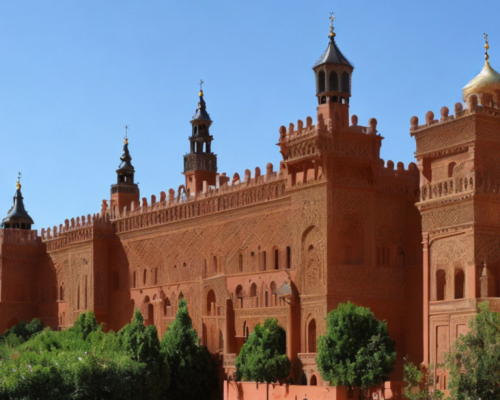 Terracotta-Colored Palace with Towering Minarets and Lush Gardens