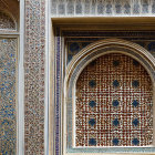 Detailed Islamic geometric pattern on architectural facade with intricate carvings