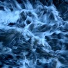 Stormy Weather: Dark Ocean Waves with White Foam