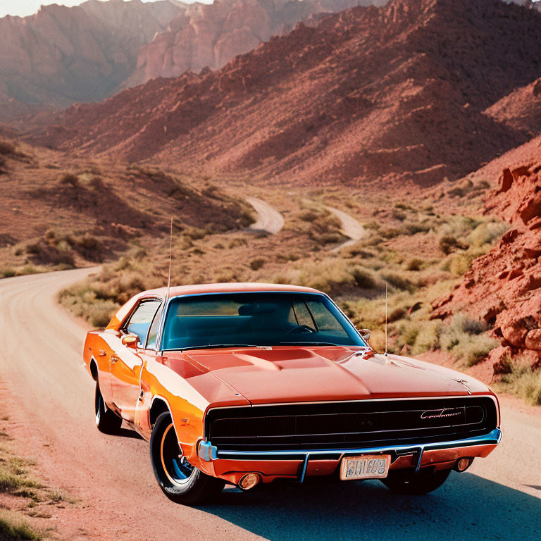 Vintage Orange Dodge Charger on Winding Road Amid Red Rock Formations
