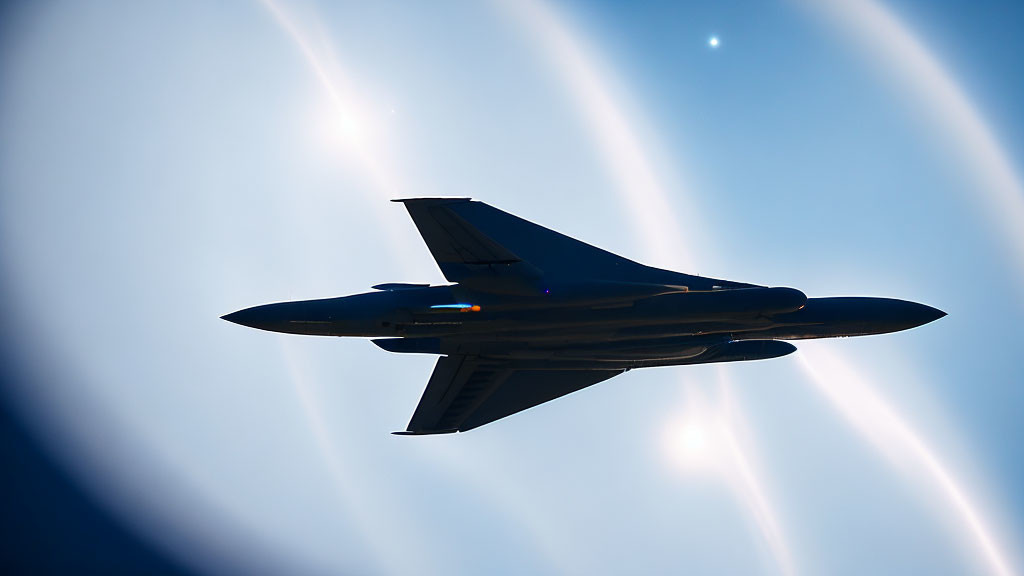 Military jet with afterburners in blue sky with sun halo.