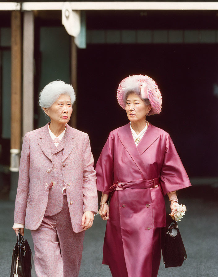 Elderly women in Japanese kimono and Western attire walking together
