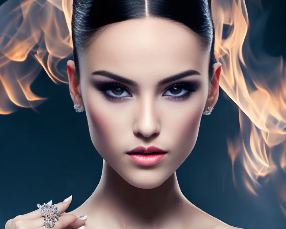 Woman with sleek hair and diamond earrings posing with flames, showcasing a sparkling ring.